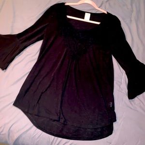 Black bell sleeved top.